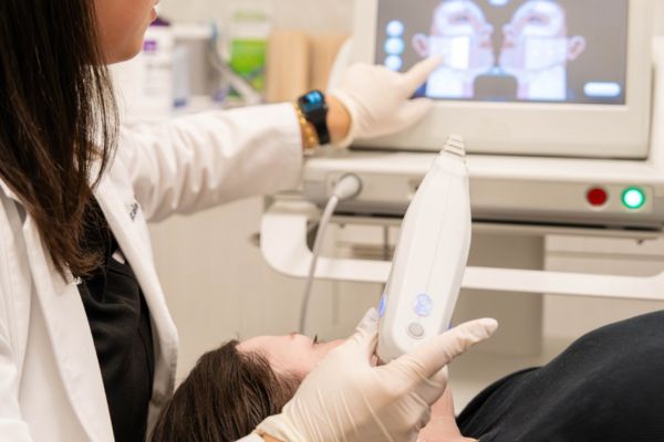 doctor explaining to patients a skin treatment